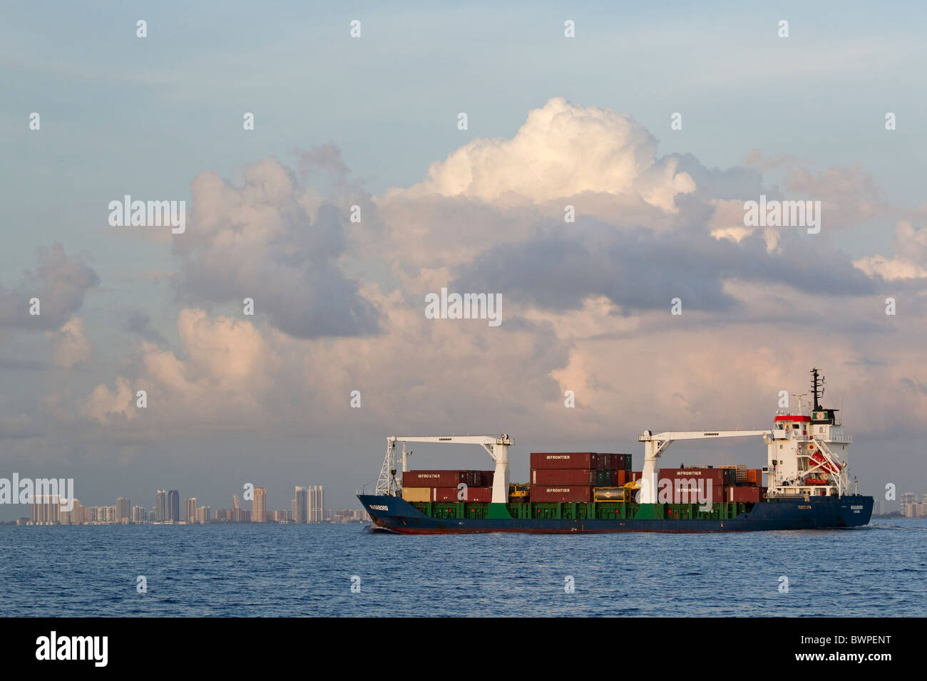 Cargo ship at sea near city, Daytona, Florida Stock Photo