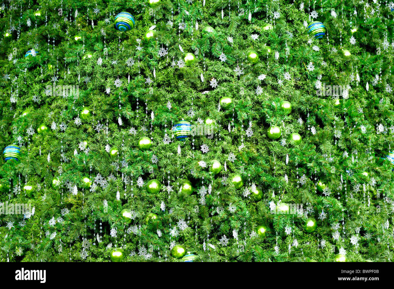 Decorated Christmas tree abstract green background Stock Photo - Alamy
