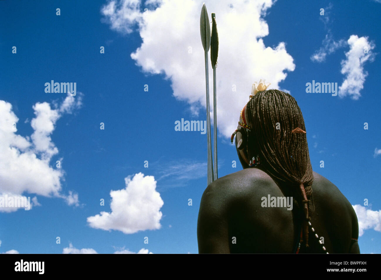 Kenya Samburu tribe Africa local man native natives sky warrior hunter hunting travel sun spear lance sh Stock Photo