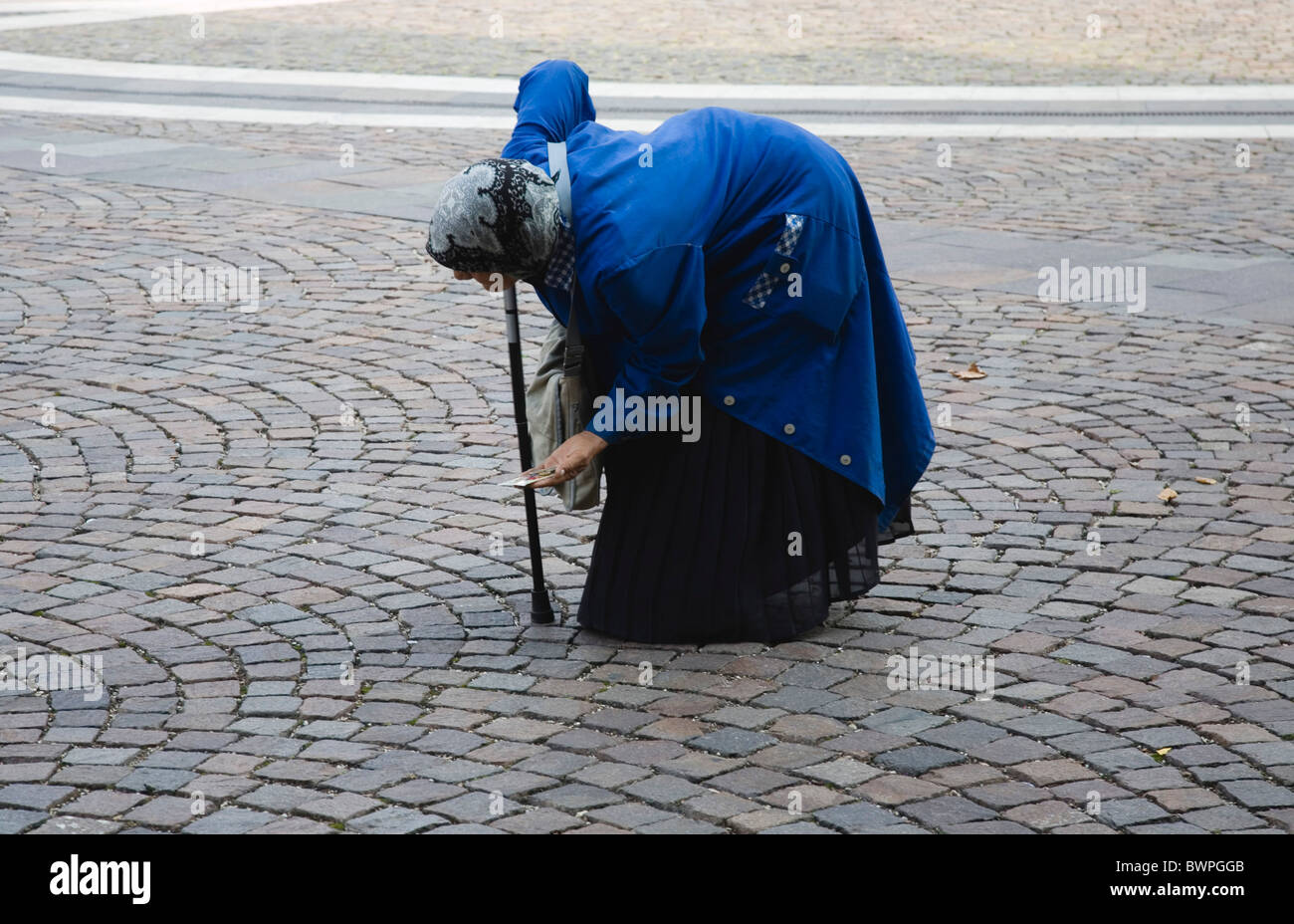 Old woman bent over hi-res stock photography and images - Alamy