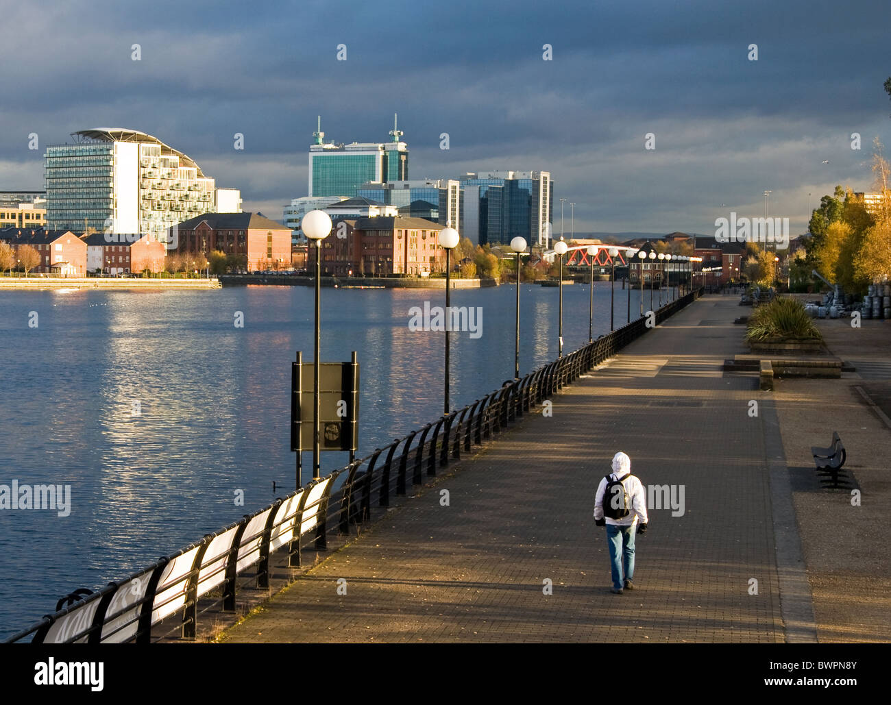 Salford Quays.Winter day.Walkway on Trafford Wharf,alongside Manchester Docks/Manchester Ship Canal, Salford,Greater Manchester Stock Photo