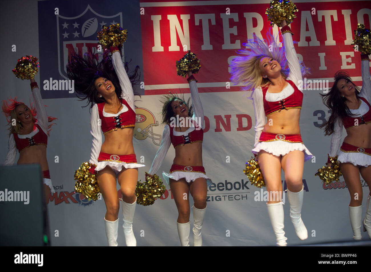 San Francisco 49er Goldrush cheerleaders perform during the NFL rally at Trafalgar Square, London on October 30, 2010, in Stock Photo