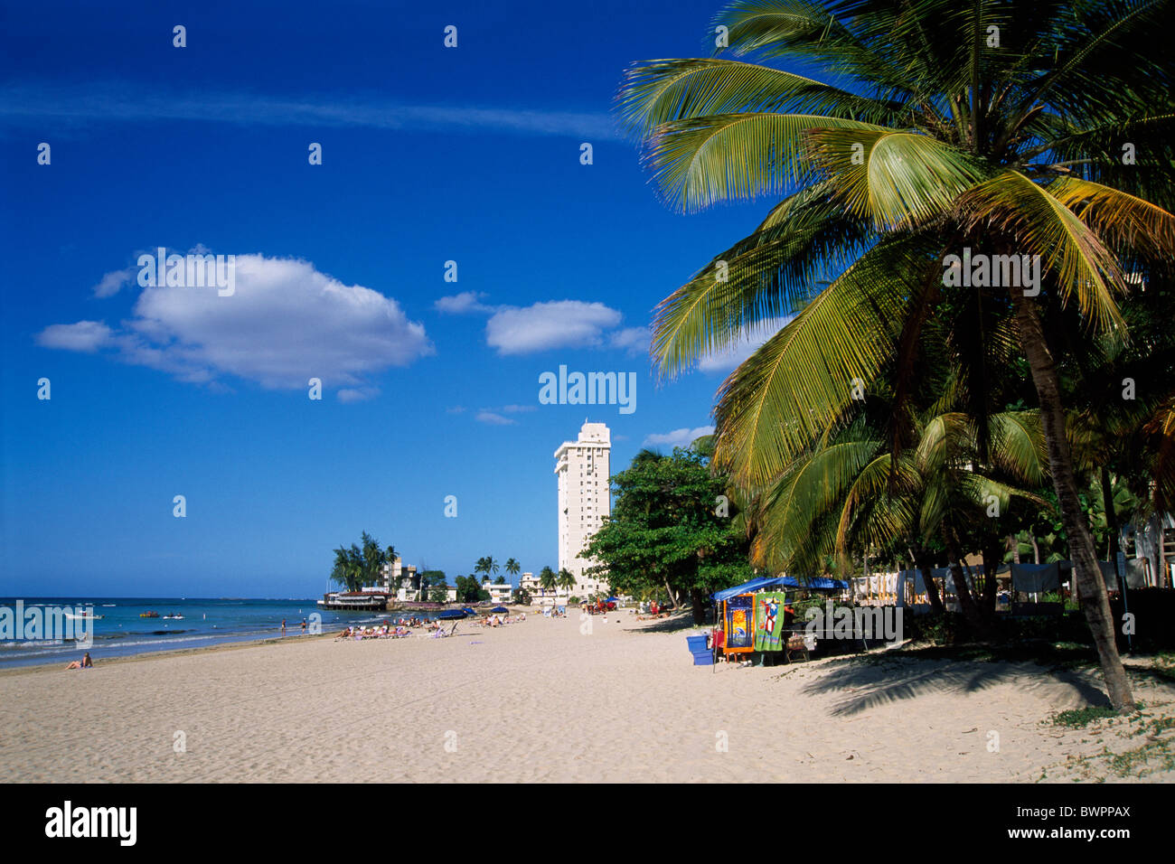 Puerto Rico Isla Verde Beach San Juan Caribbean island Greater Antilles beach palm trees holiday vacation tr Stock Photo