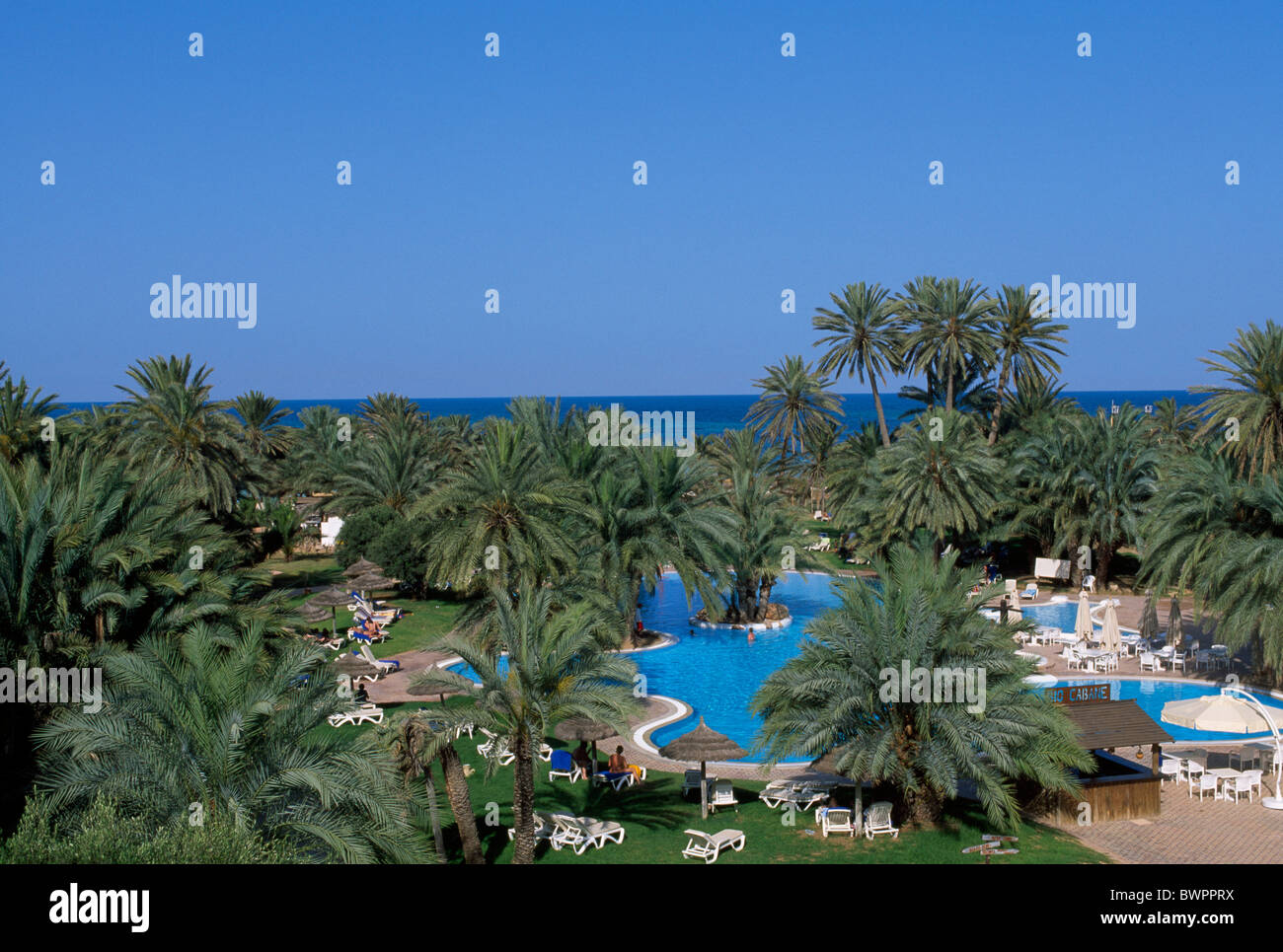 Tunisia Djerba island Hotel Odyssee Zarzis Oasis Africa North Africa Mediterranean Sea coast island Pool bea Stock Photo