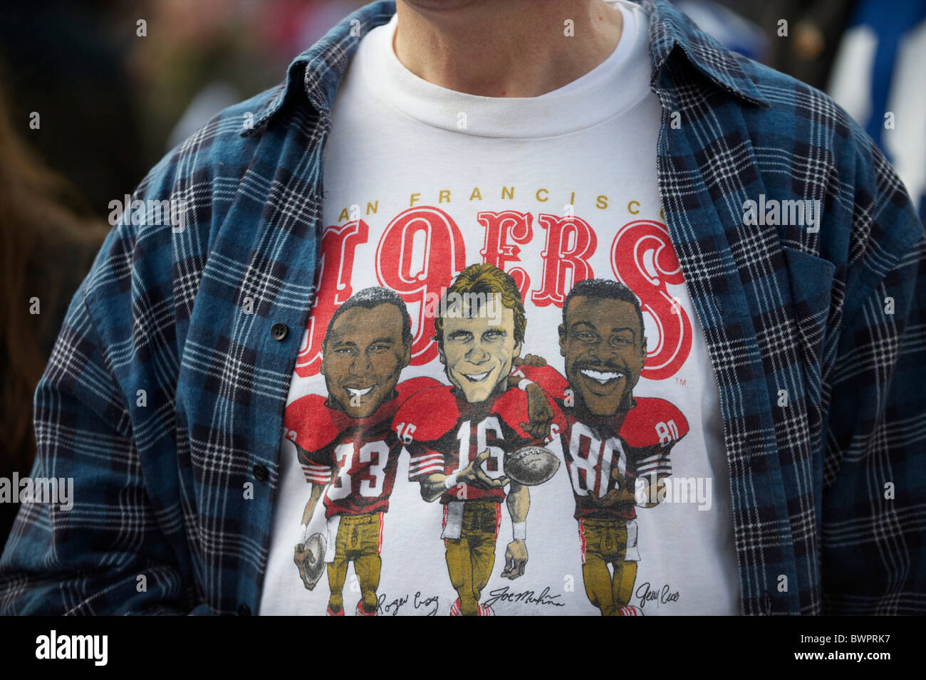 A San Francisco 49er fan wears a vintage t-shirt featuring all time great  players, Roger Craig, Joe Montana, and Jerry Rice Stock Photo - Alamy