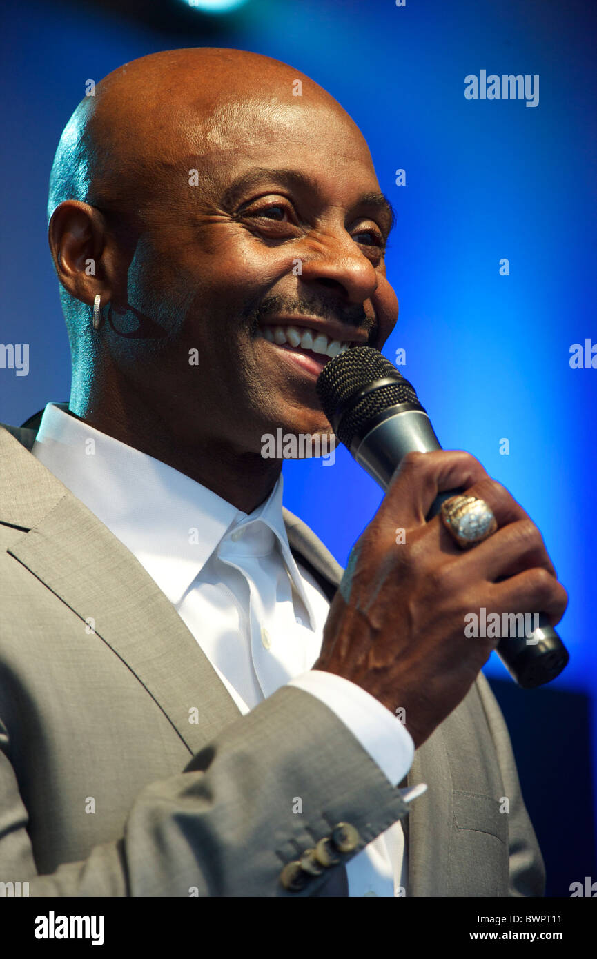 Hall of Fame Wide Receiver Jerry Rice speaks to fans at the NFL rally at Trafalgar Square, London on October 30, 2010, in Stock Photo