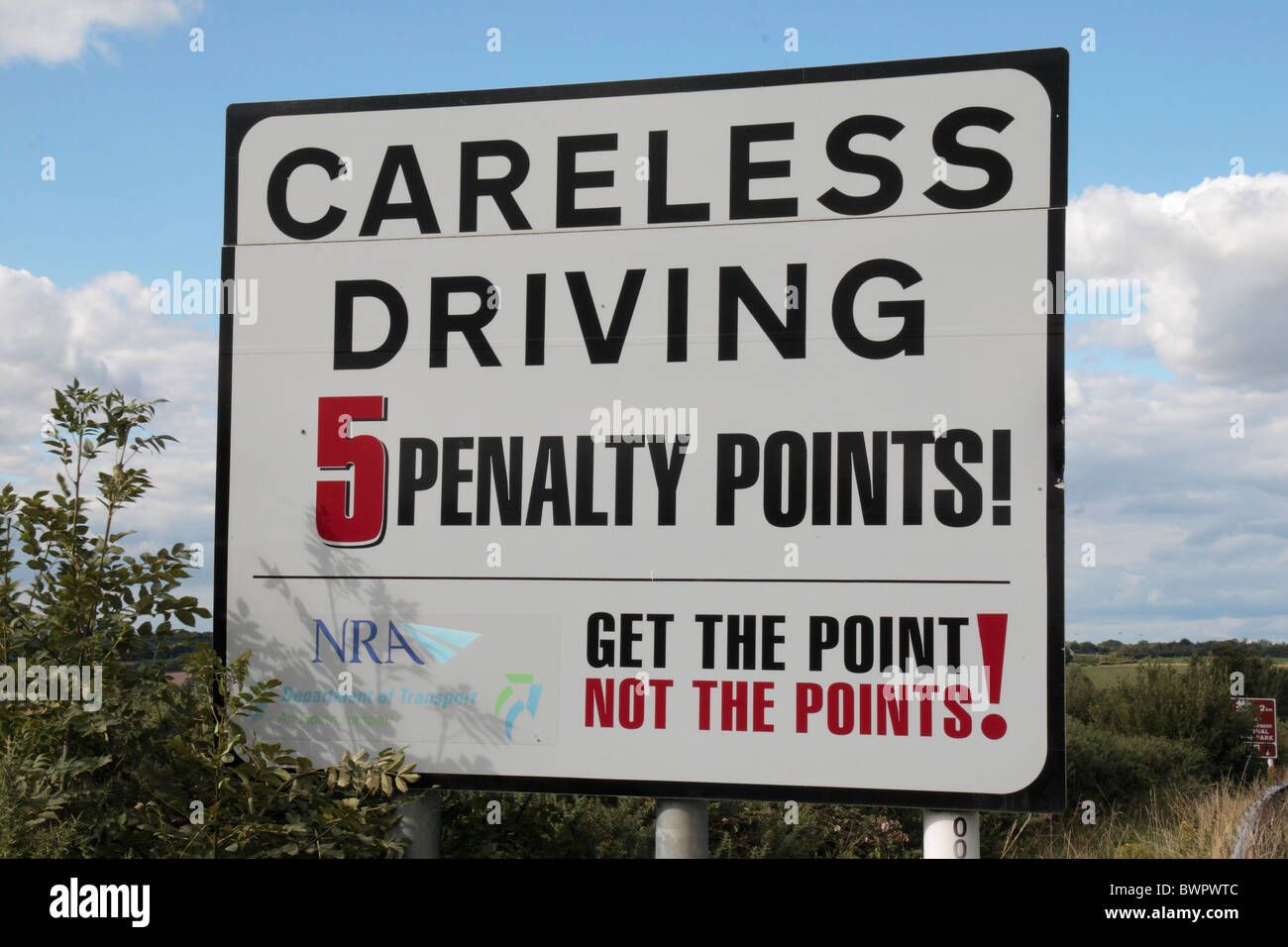 A 'Careless Driving' warning side on the N11 roadside in County Wexford, Ireland, Eire. Stock Photo