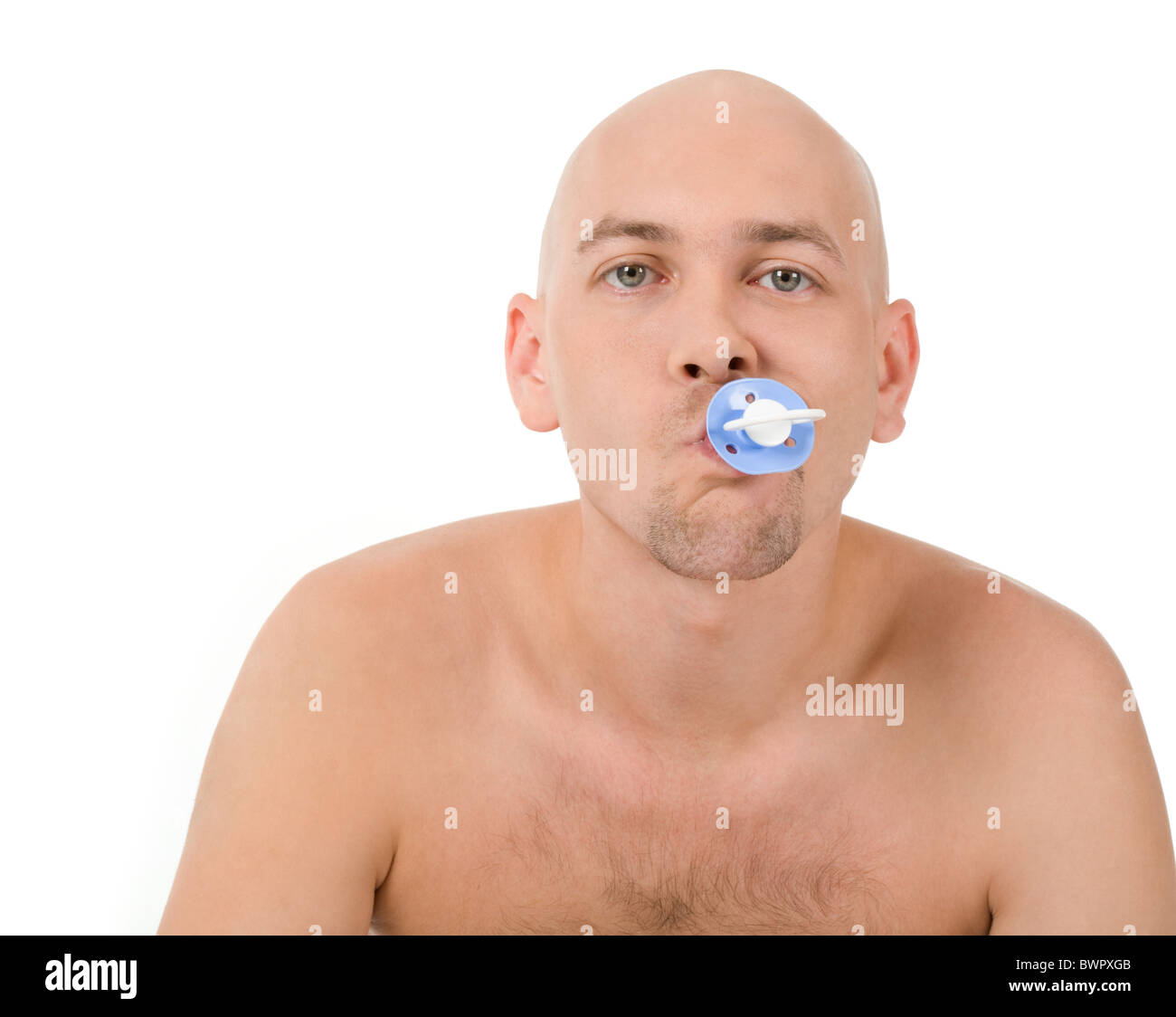 Baby man with pacifier in mouth looking at camera over white background