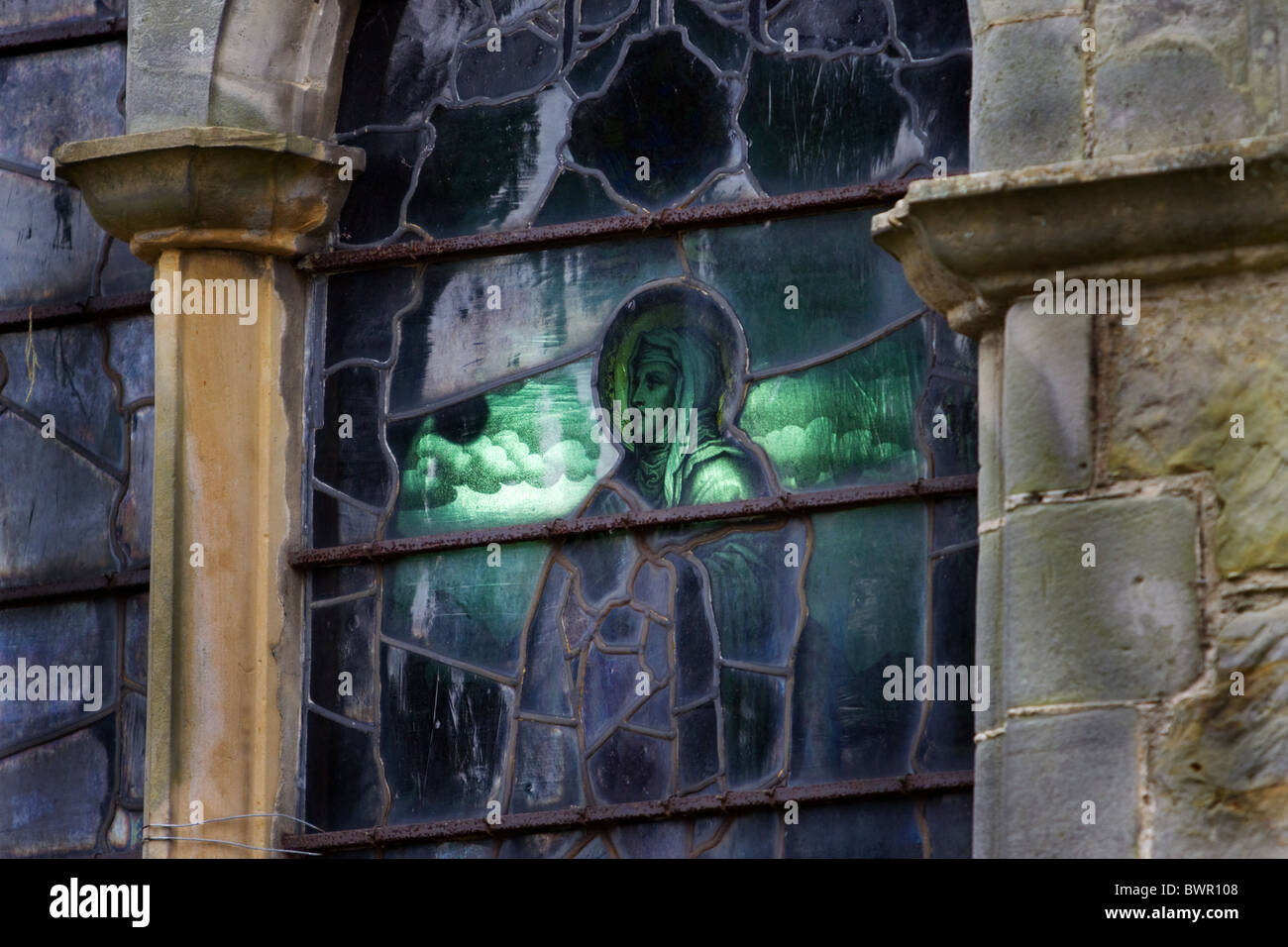 Church window light Madonna angelic Stock Photo