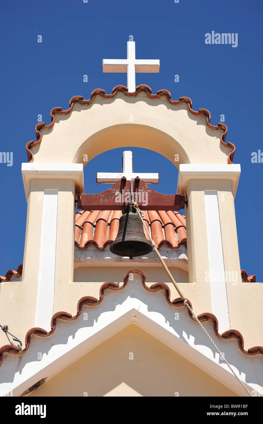 Greek orthodox church bell and cross. Image at Spilli Monastry, Crete, Greece Stock Photo