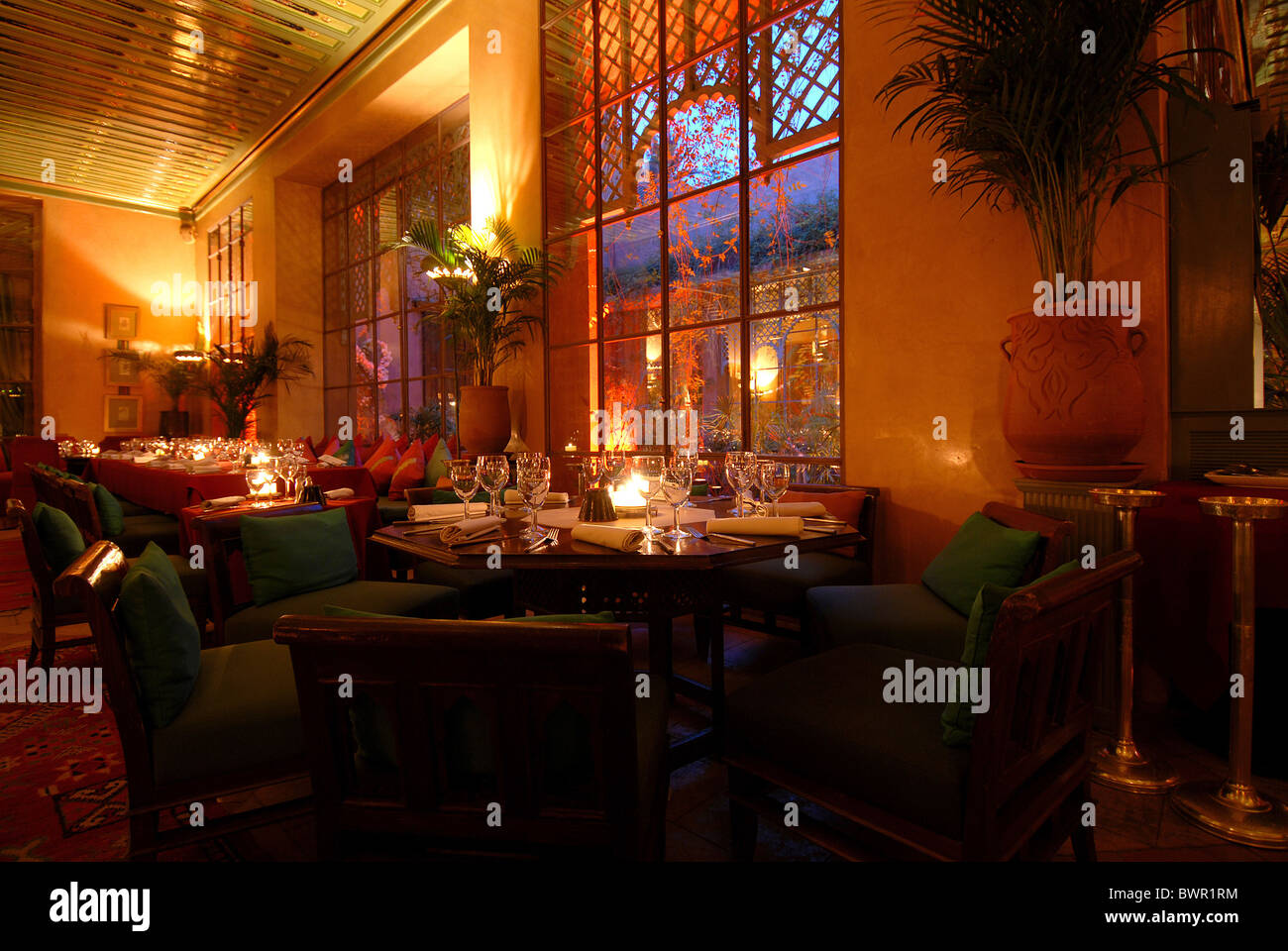 Morocco Africa Marrakech club restaurant lounge lifestyle evening illuminated candles lights ambience ambi Stock Photo