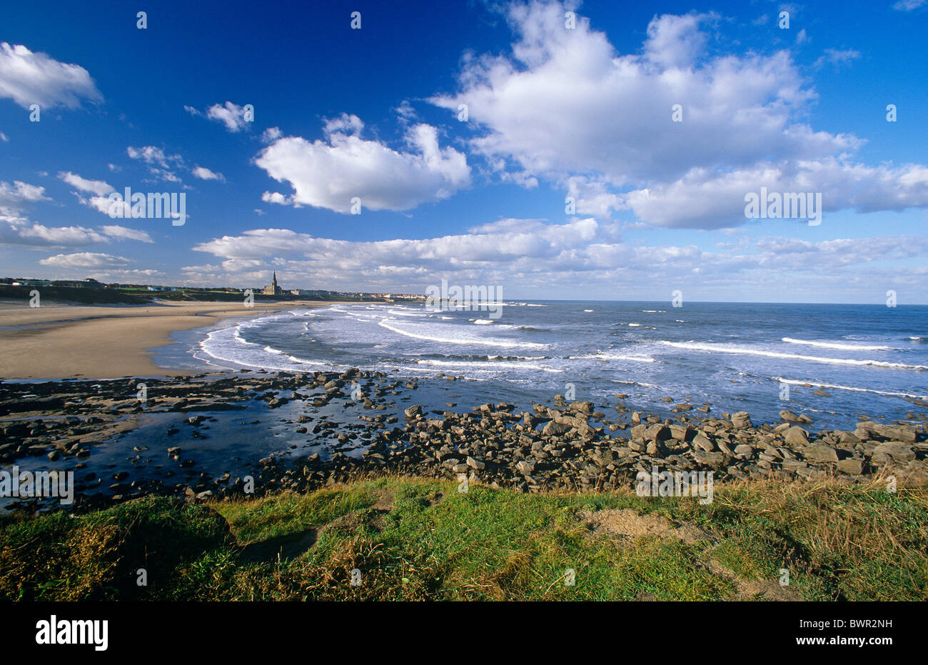 A sweeping view in summer of Longsands beach at Tynemouth, North Tyneside Stock Photo