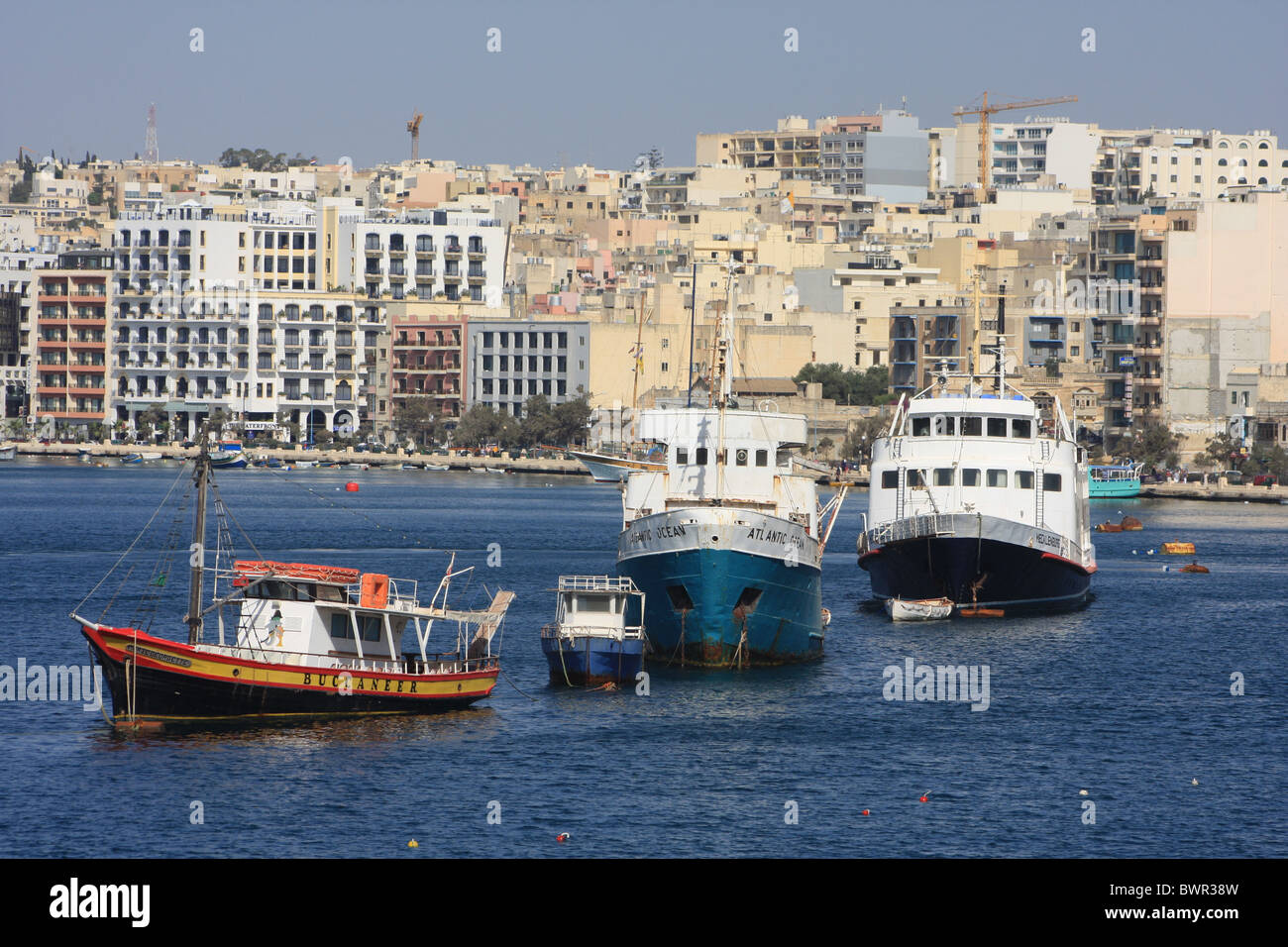 Malta Sliema boats ships Hotel buildings Marsamxett harbor marina harbor Stock Photo
