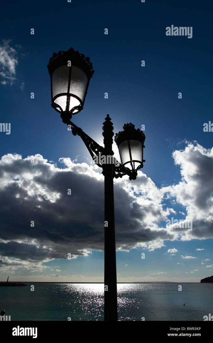 Streetlamp against a cloudy background Stock Photo