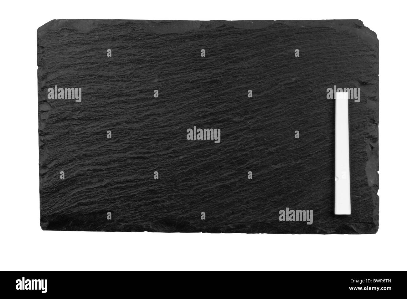 A blank blackboard with chalk. Studio shot isolated on white with clipping path. Stock Photo