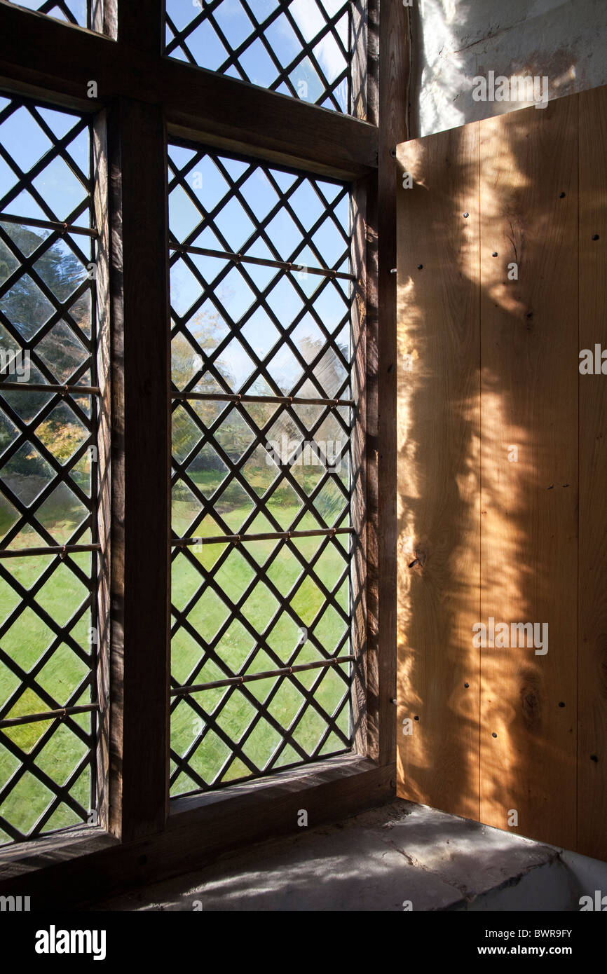 Light shining through leaded window Tretower Court Powys Wales UK Stock Photo