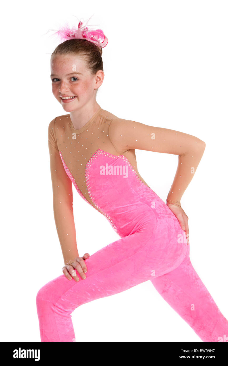 Studio shot of beautiful young girl in pink modern jazz dancing costume