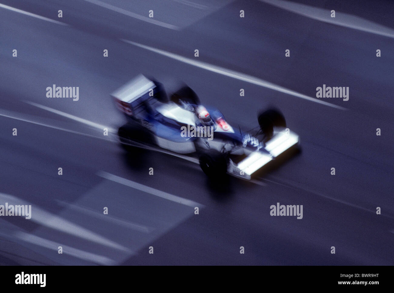 Blurred F1 auto racing action. Stock Photo