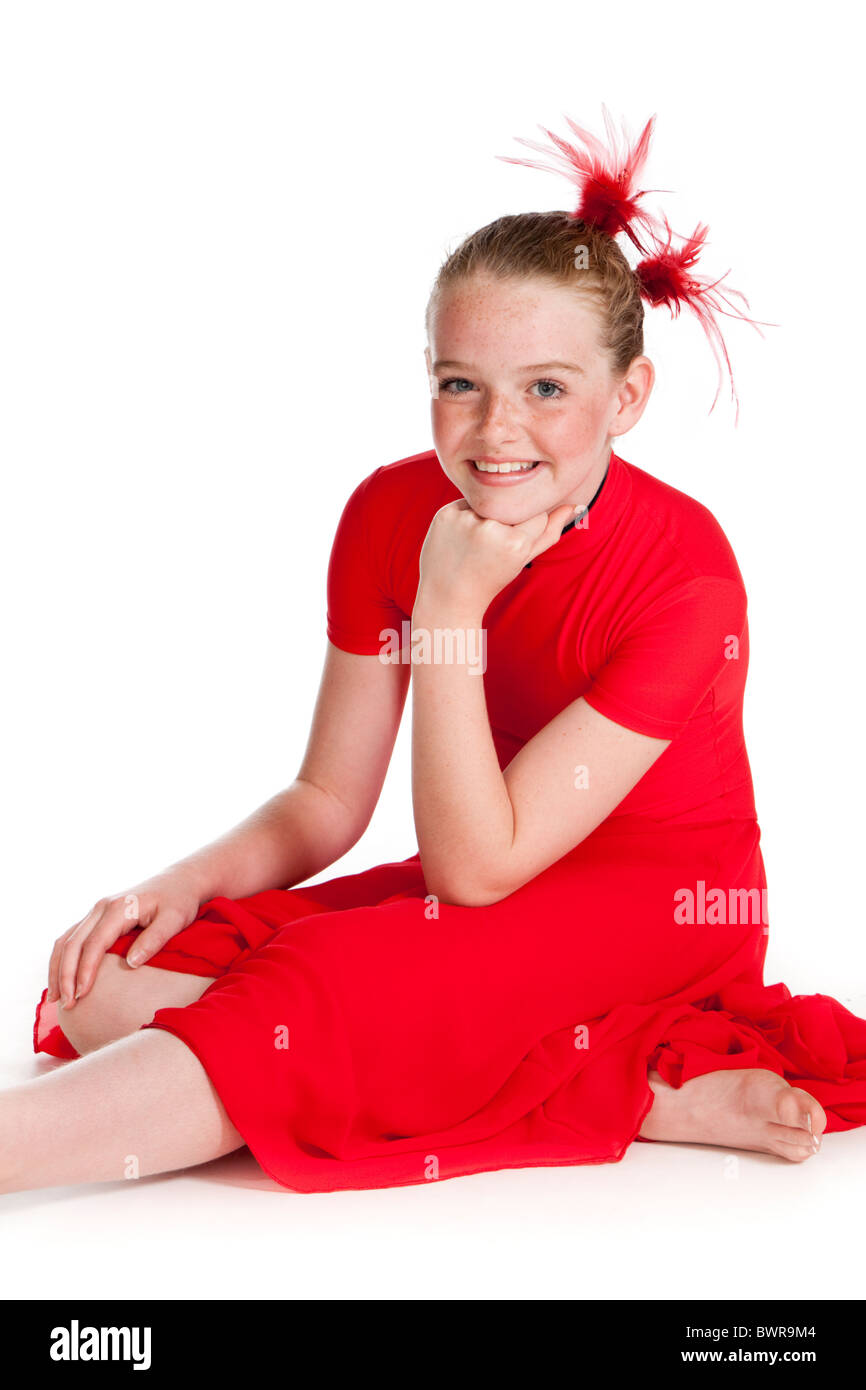 Studio shot of beautiful young girl in red modern lyrical dancing costume Stock Photo