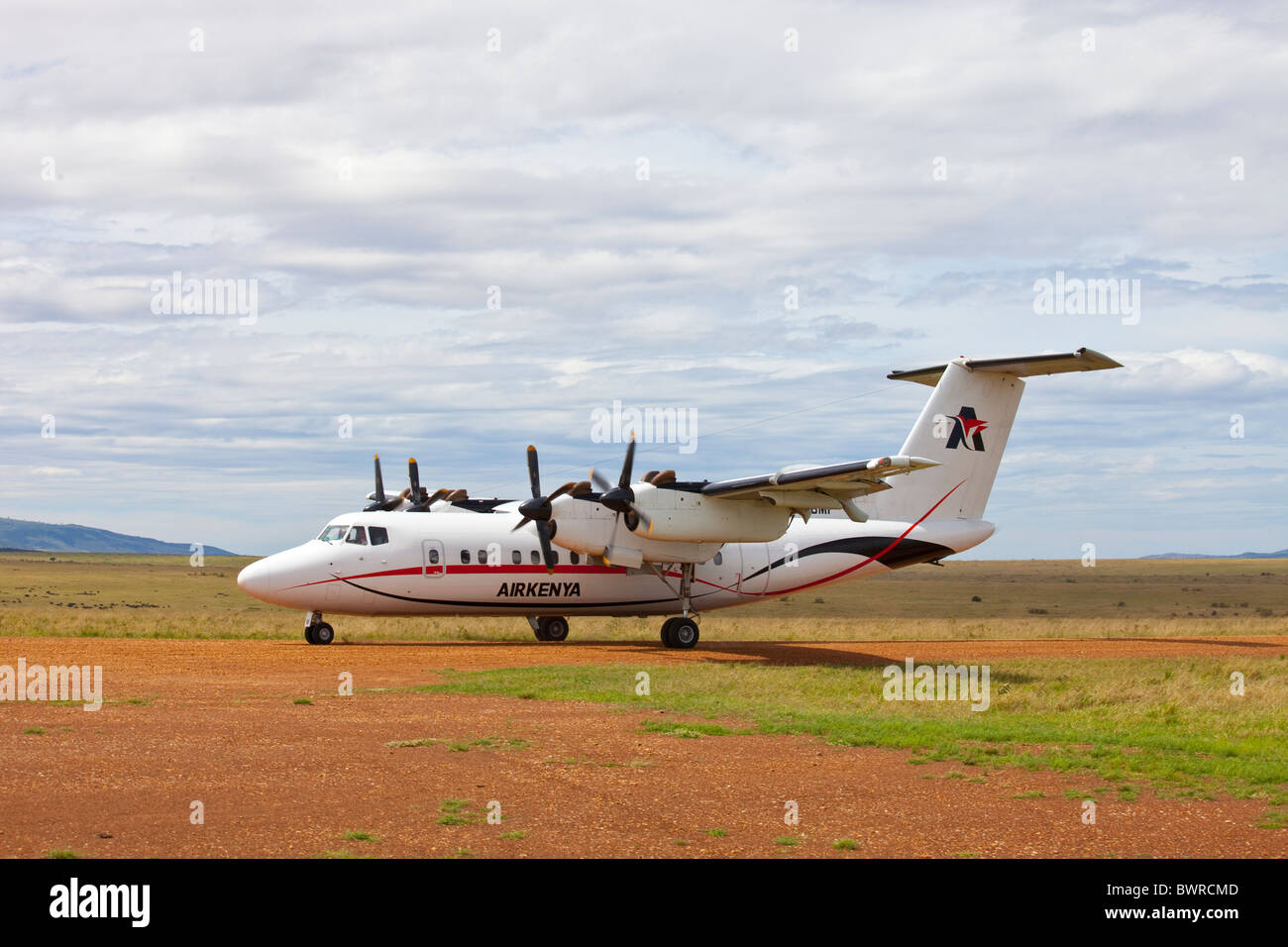 Air Kenya flight arriving in the Masai Mara, bringing tourists for ...