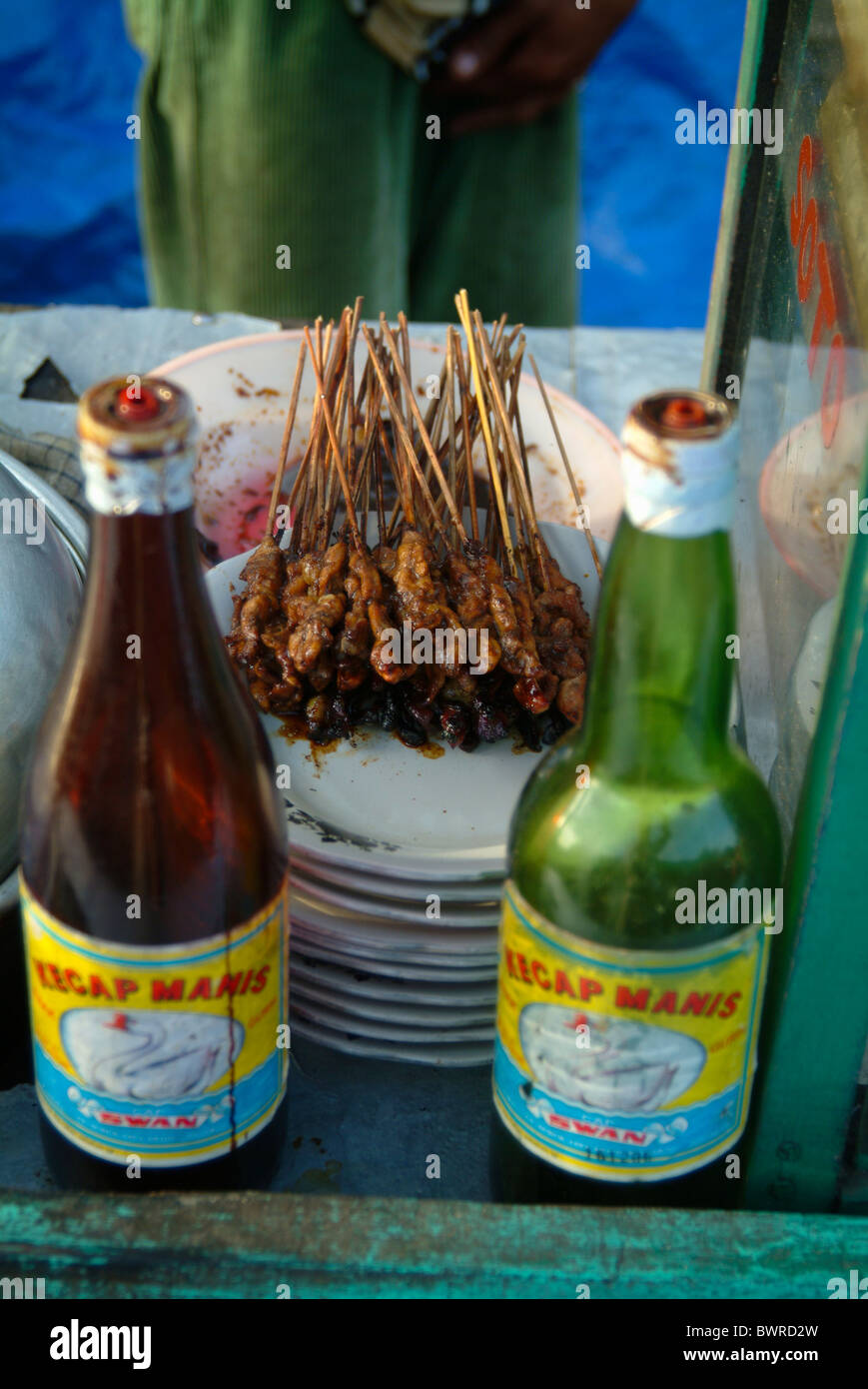 At an Ubud, Bali, traditional market, a soup and sate sellers' cart has