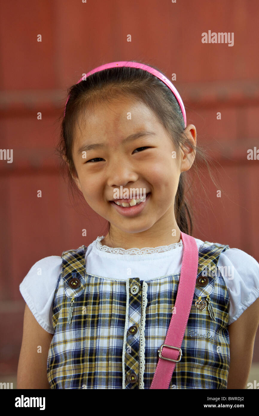 Young smiling Korean girl in Seoul South Korea. JMH3946 Stock Photo