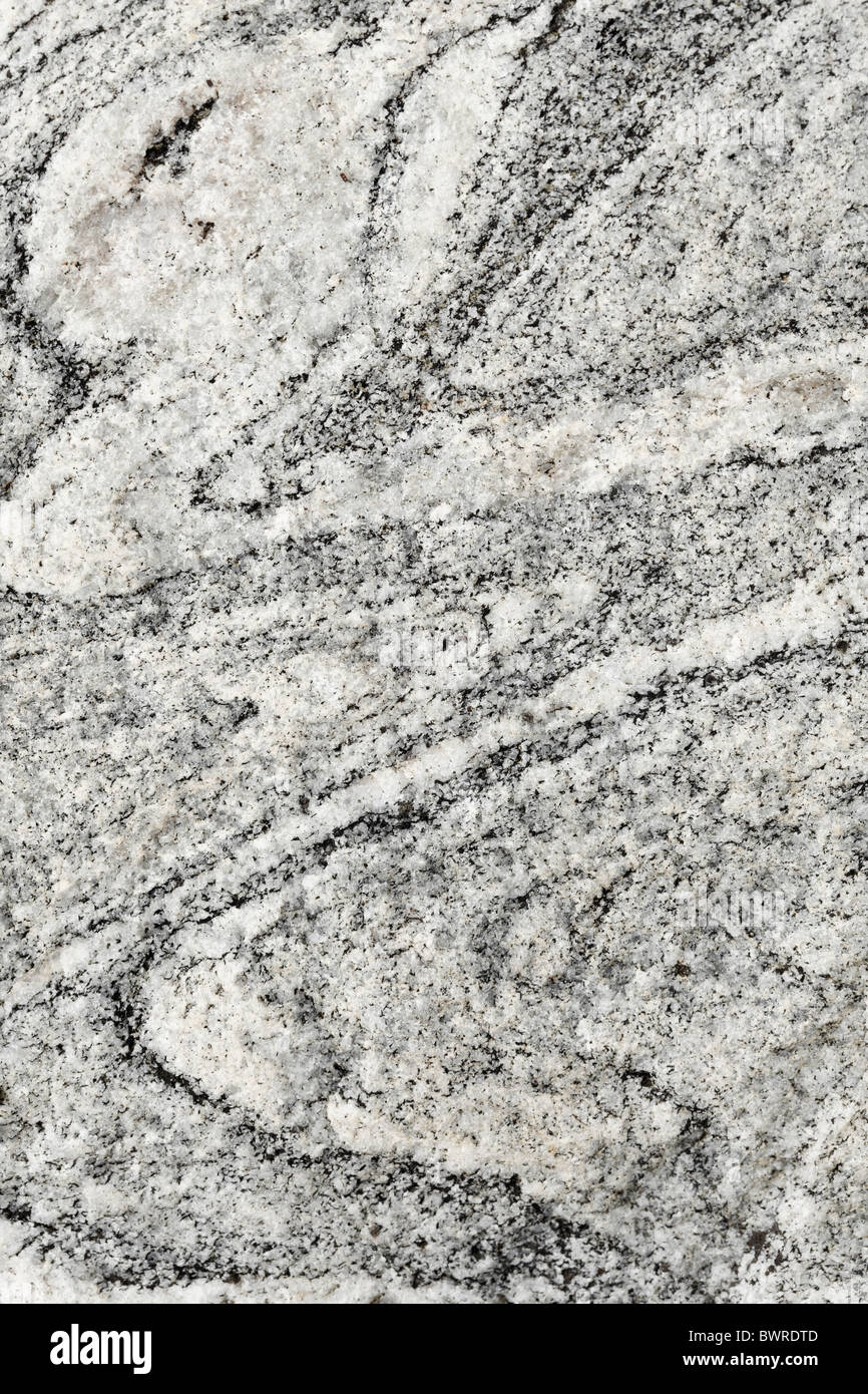 Raw natural stone - a gray granite background Stock Photo - Alamy