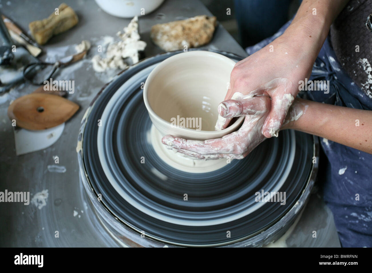 Pottery Ceramic Potteries Creativ Hands Woman Shaping Wheel Handwork Work Working Female potter Stock Photo