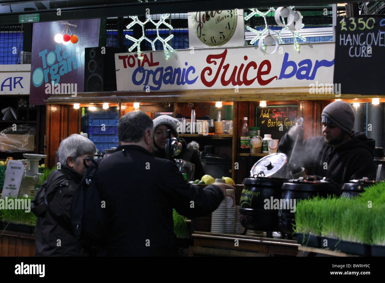 Purchasing a hot drink at The Organic Juice Bar in Borough Market