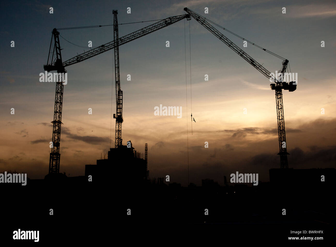 Cranes on a building site near Corporation Street in Manchester , England Stock Photo