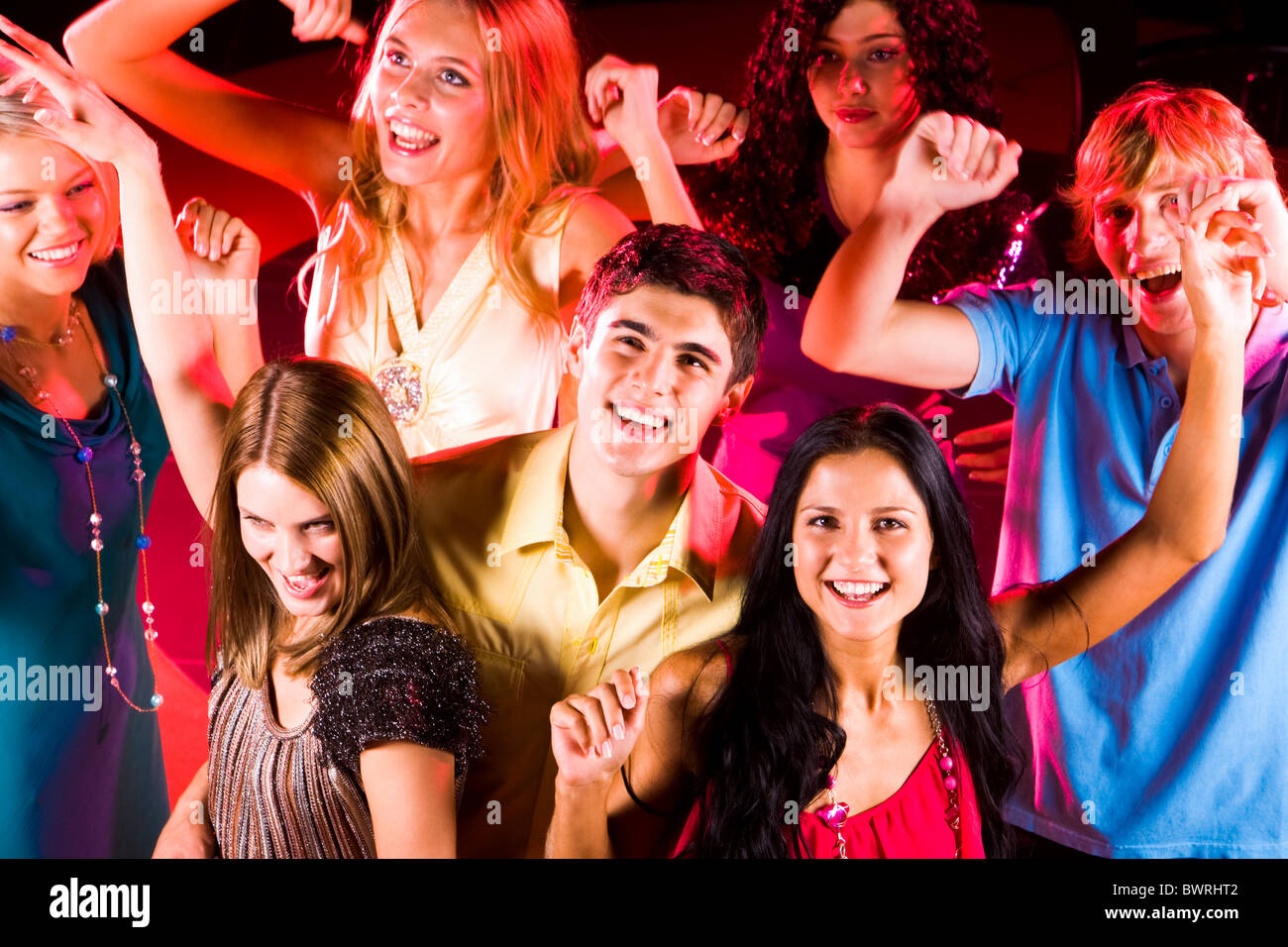 people dancing in a night club enjoying themselves Stock Photo - Alamy