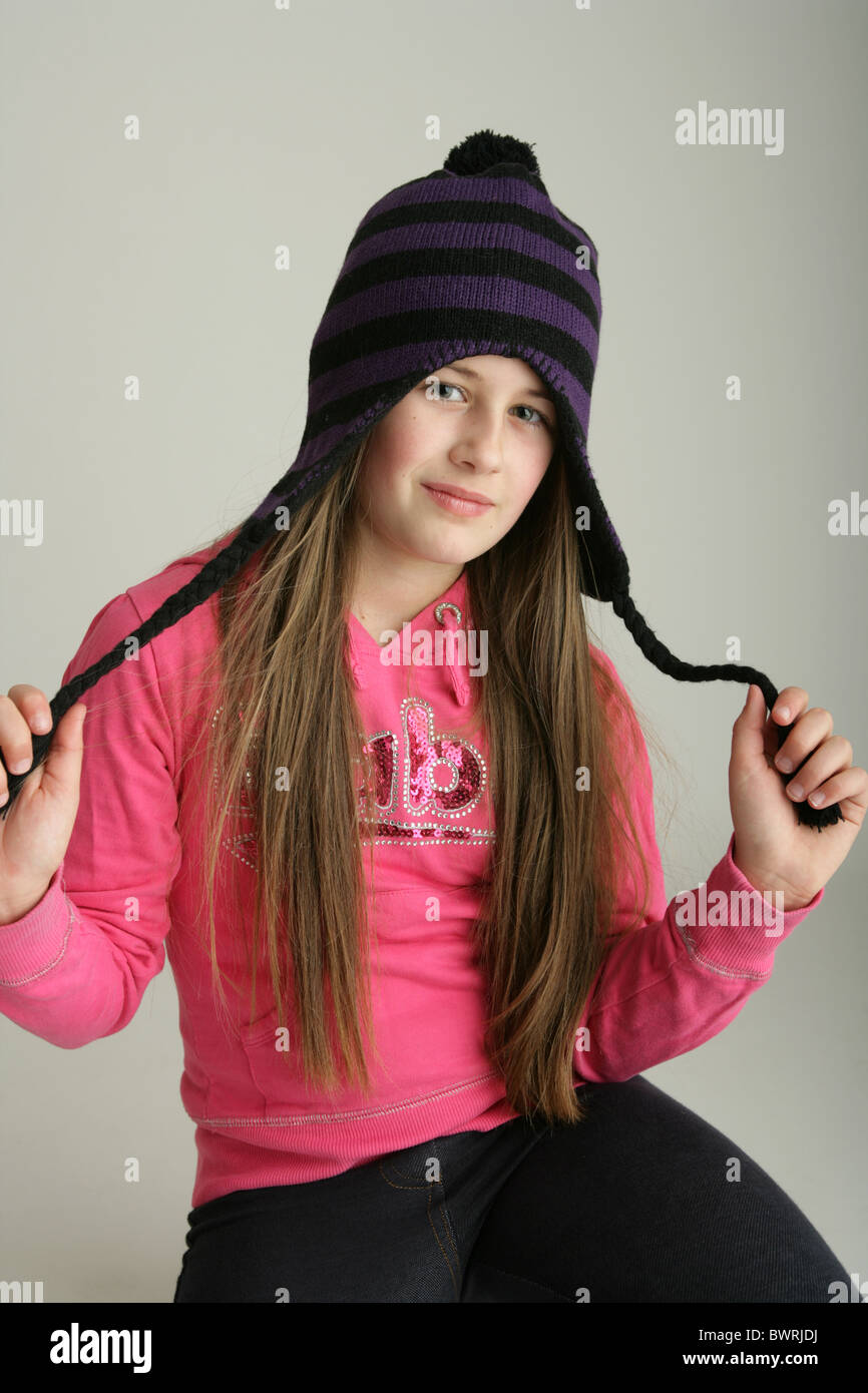 Ten year old girl wearing a woolly hat Stock Photo Alamy