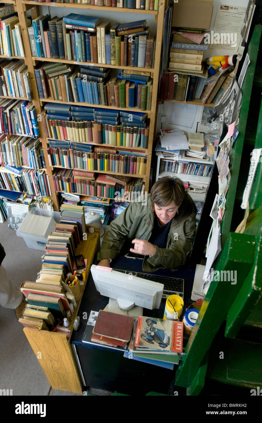 SecondHand owner at work in Falmouth, Cornwall Stock Photo