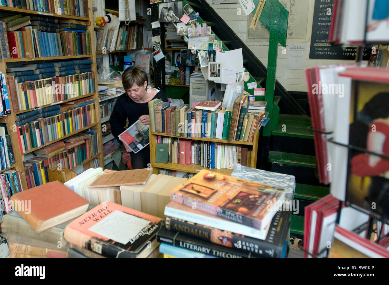 SecondHand owner at work in Falmouth, Cornwall Stock Photo