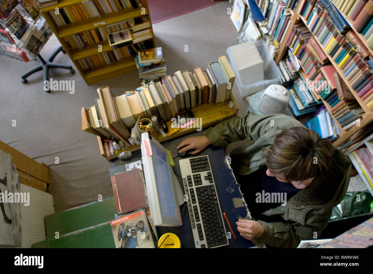 SecondHand owner at her desk Stock Photo Alamy