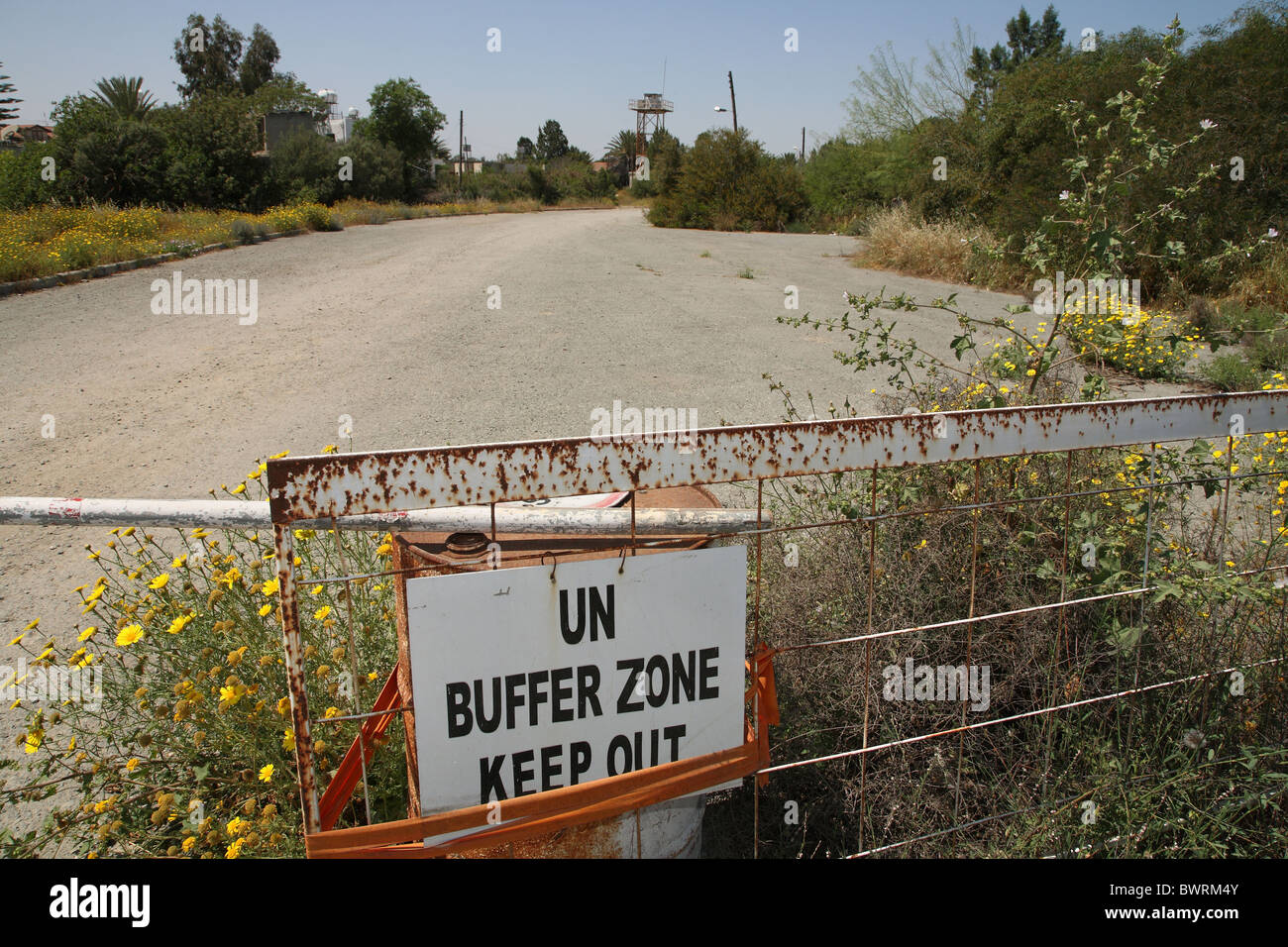 Sign on a fence labeled UN Buffer Zone Keep Out, Nicosia, Cyprus Stock