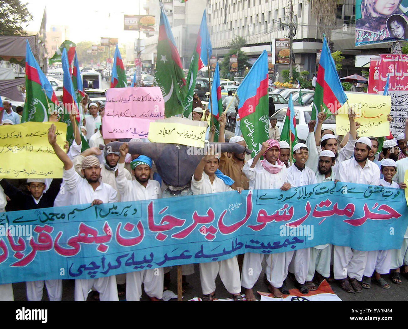 Activists of Jamiat Talba Arabia (JTA) chant slogans against US and India during a protest demonstration at Karachi press club Stock Photo
