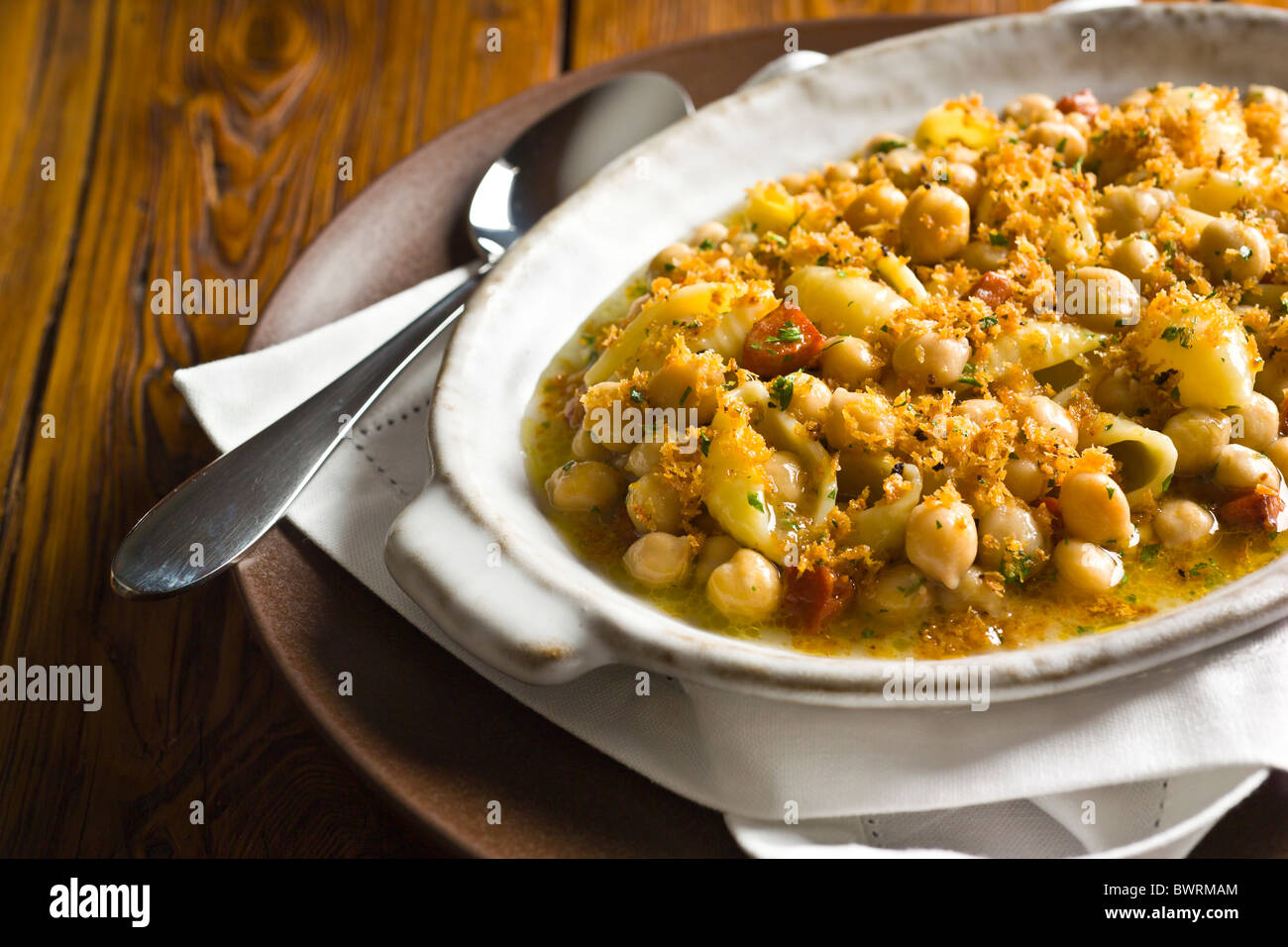Conchiglie with Chickpeas, Chorizo and Breadcrumbs. Stock Photo