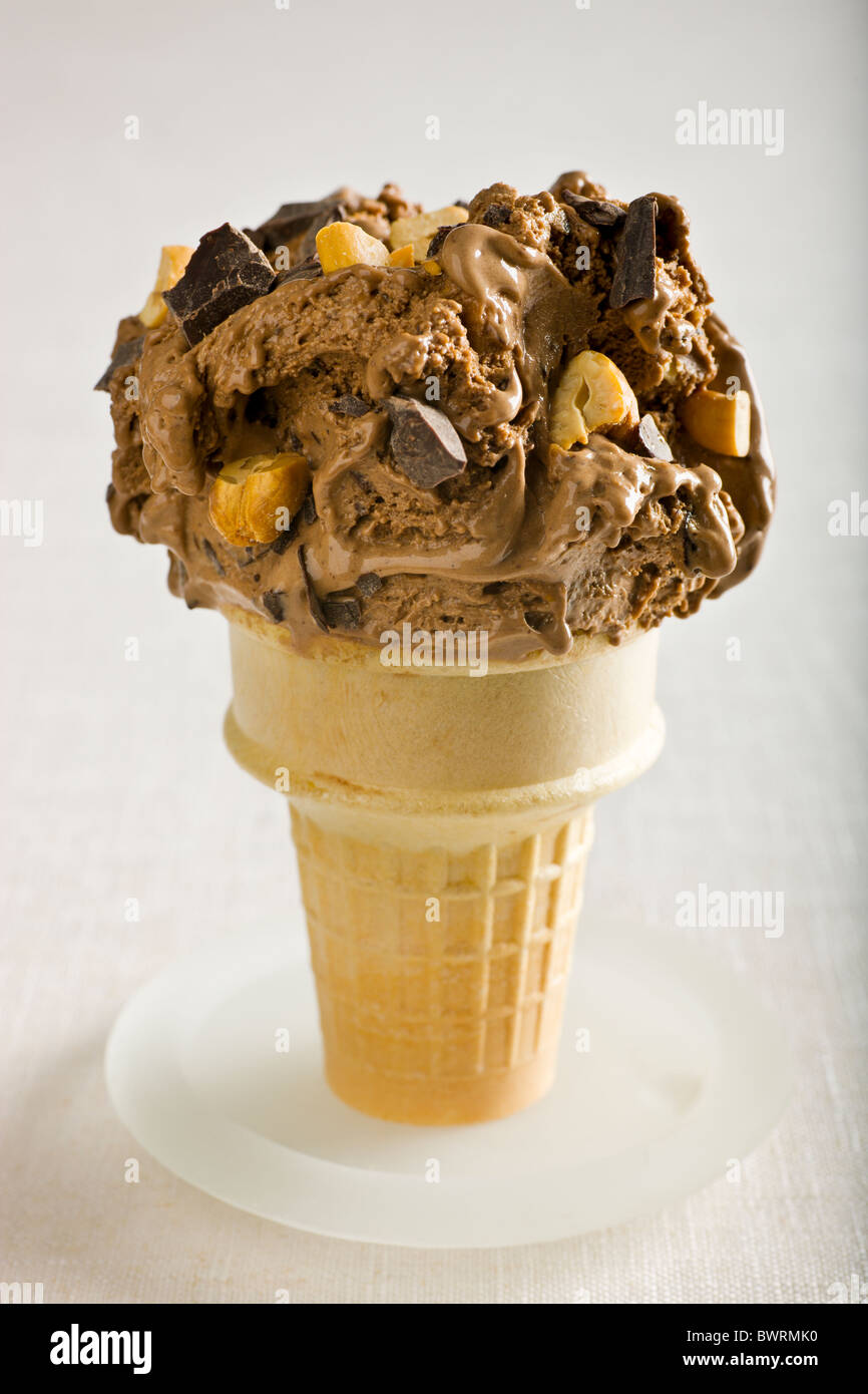Chocolate Ice Cream with Chocolate Chunks and Chopped Salted Cashews Stock Photo