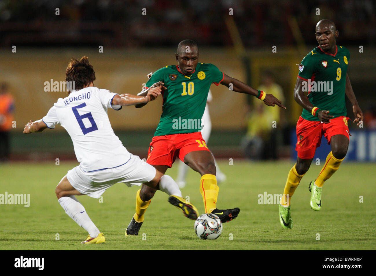 Jacques Zoua of Cameroon (10) in action against Jeong Ho Hong of South Korea (6) during a FIFA U-20 World Cup Group C match Stock Photo
