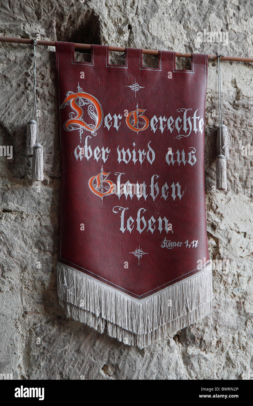 'Der Gerechte aber wird aus Glauben leben', the just shall live by faith, flag, great hall, Burg Hardeg palace Stock Photo