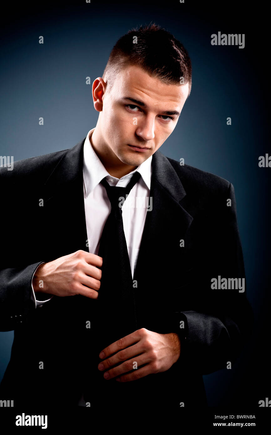 Young man in a suit, portrait Stock Photo - Alamy