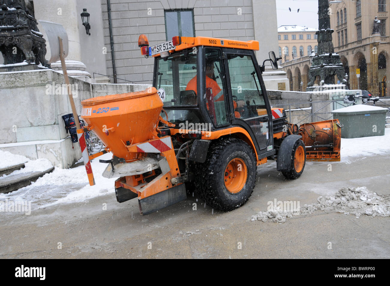 Snow plow in Munich Stock Photo