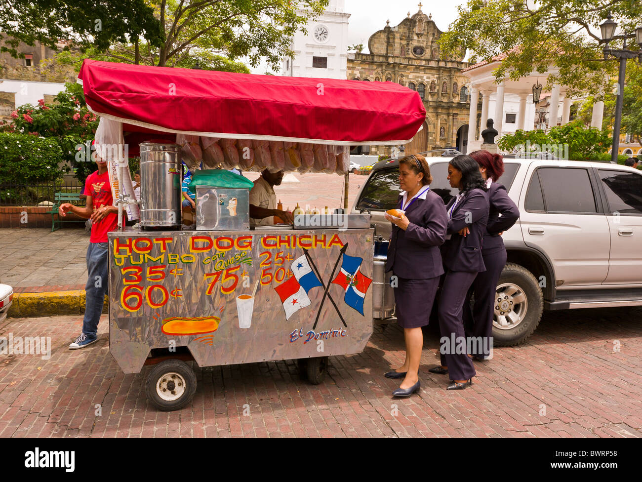PANAMA CITY, PANAMA - People at hot dog vendor, Casco Viejo, historic city center. Stock Photo