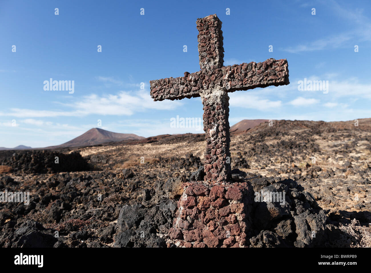Cross made of volcanic rocks near Los Cocoteros, Lanzarote, Canary Islands, Spain, Europe Stock Photo