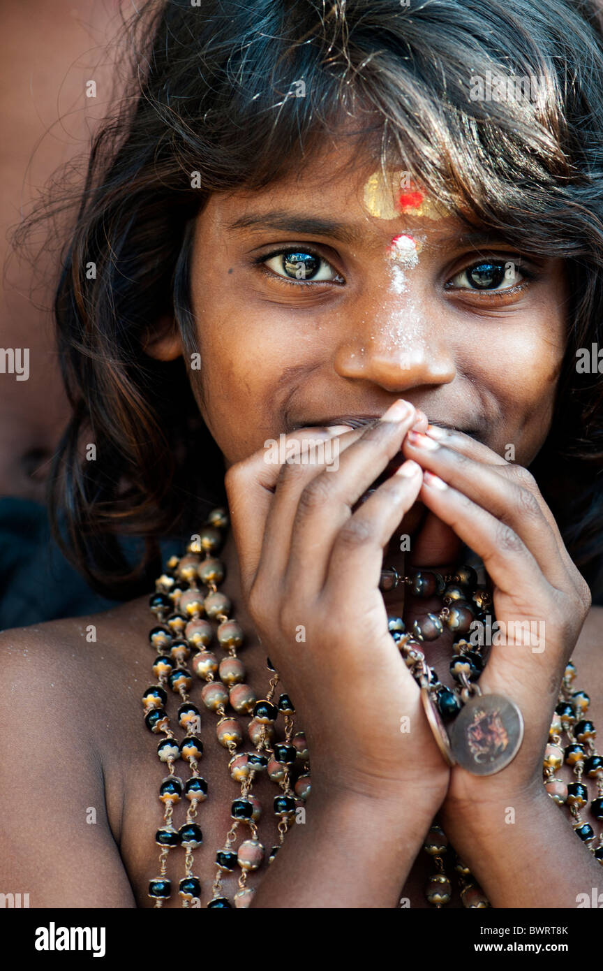 Smiling staring Indian girl on Ayappa pilgrimage. Andhra Pradesh, India Stock Photo