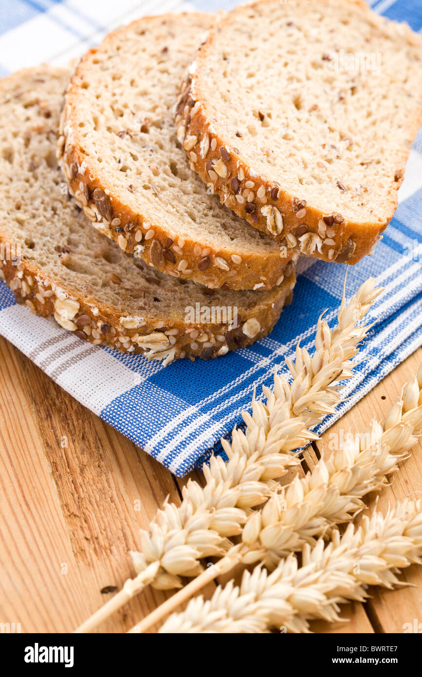 whole wheat bread on kitchen table Stock Photo - Alamy