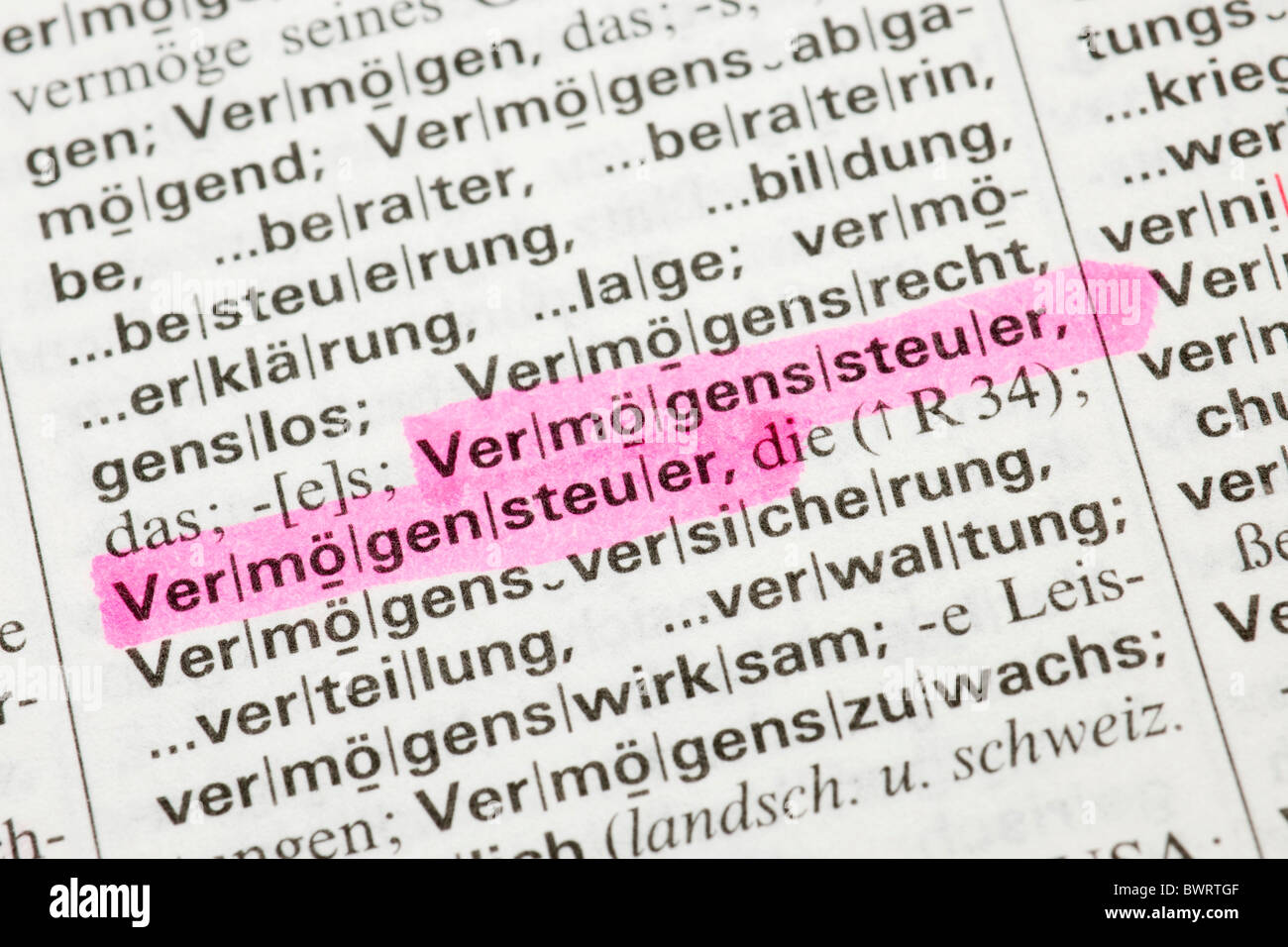 Dictionary entry, Vermoegenssteuer, German for property tax Stock Photo
