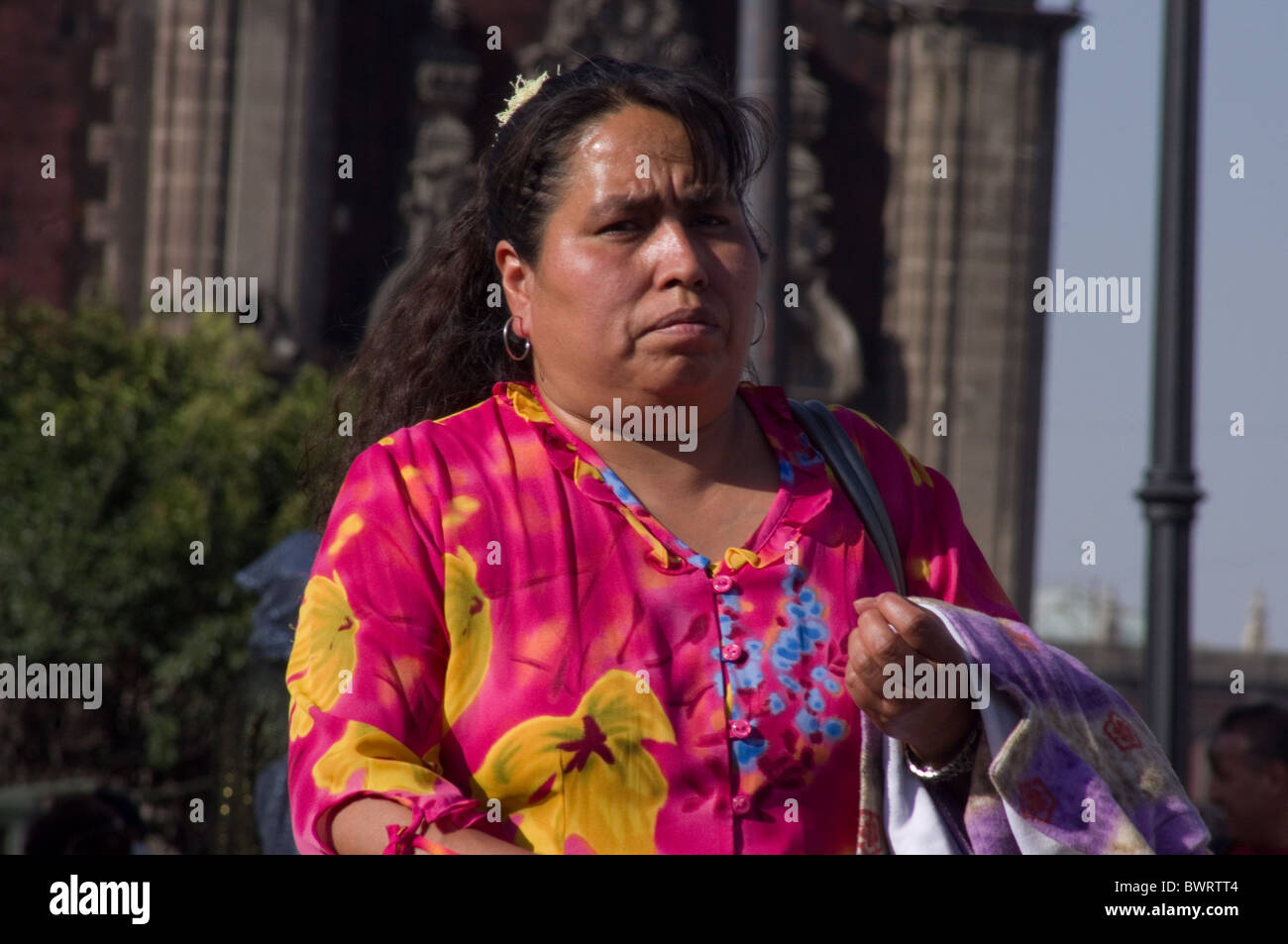 Mexican woman walking in the Zocalo Stock Photo