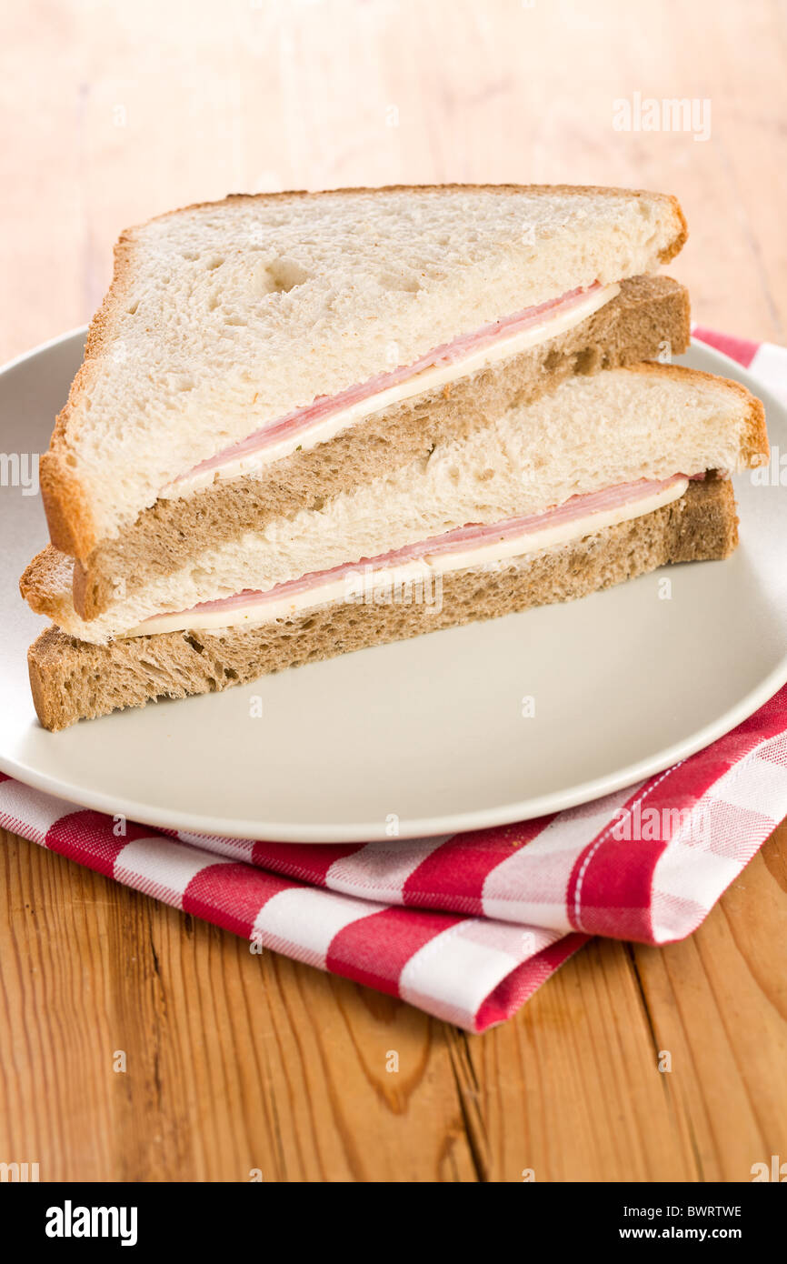 the ham sandwich on checkered napkin Stock Photo